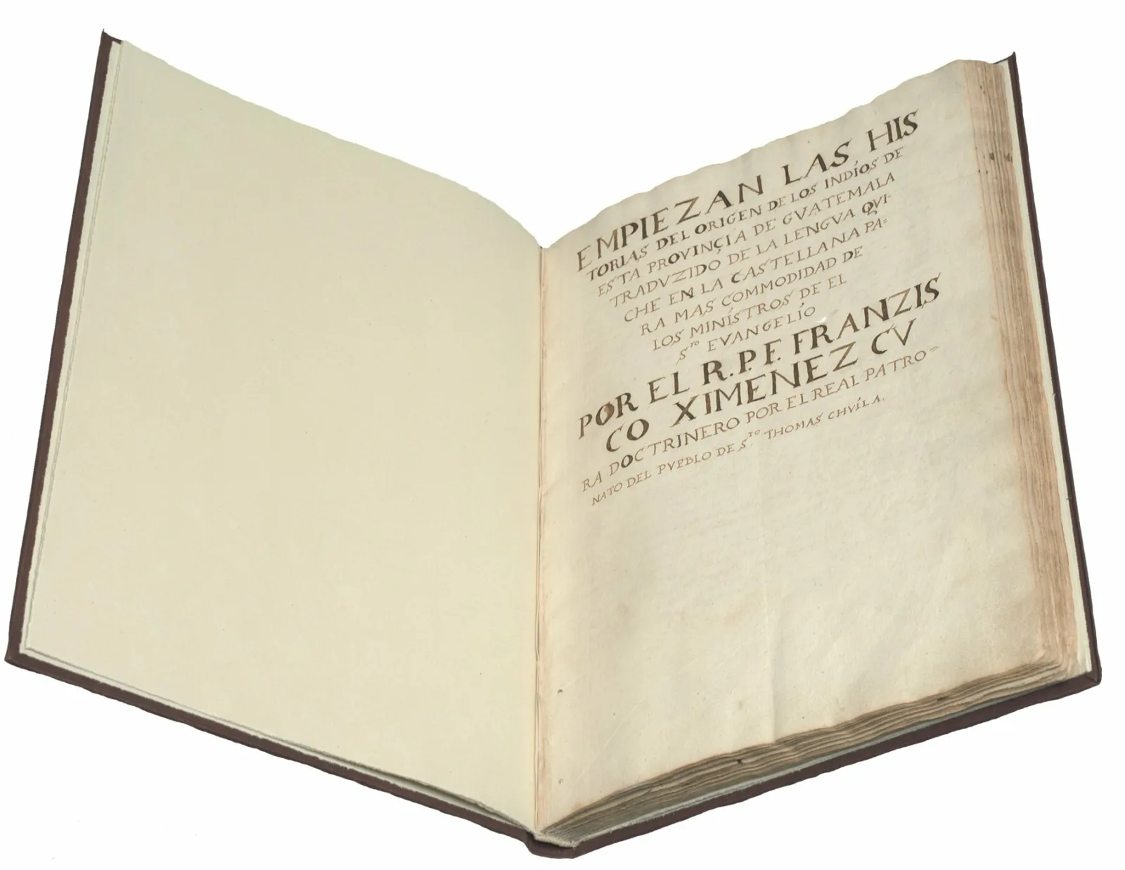 Popol Vuh A book is open. The page to the left is blank, the page to the right is the beginning of the Maya creation story. The text is in Spanish. The first few words are “Empiezan las historias del origen de los indios de esta provincia de Guatemala.”