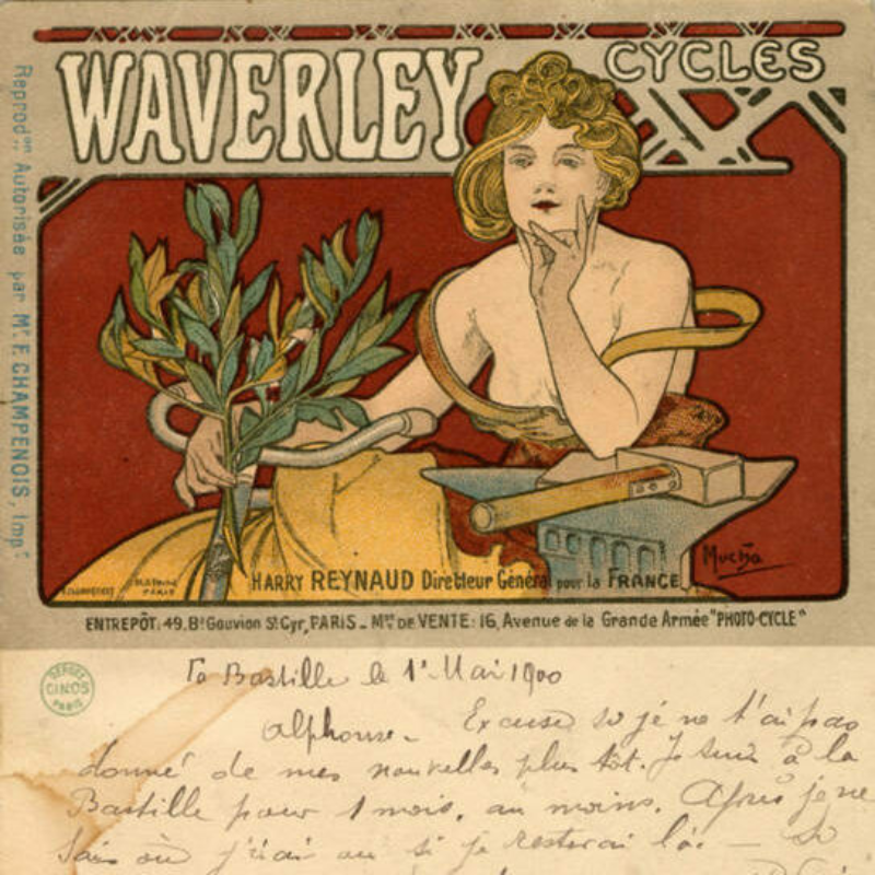 Waverley Cycles, Artist Alfonse Mucha A woman in a yellow dress holds a few green branches with leaves in her hand. Above this illustration of her are the words "Waverley Cycles." Below the image is handwritten text, likely a postcard message that a previous owner wrote.